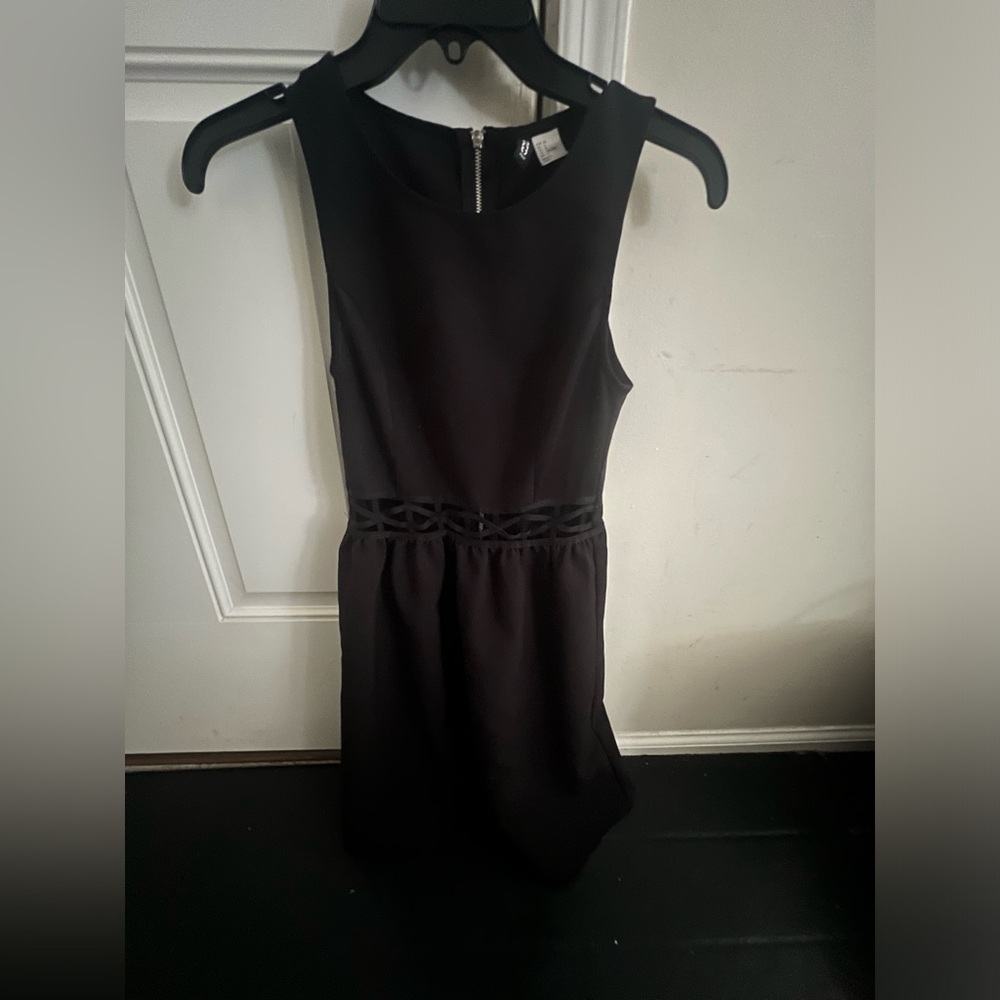 Black dress by DIVIDED